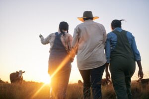 women-farmer-group-and-walking-in-countryside-on-2026-03-25-07-42-26-utc